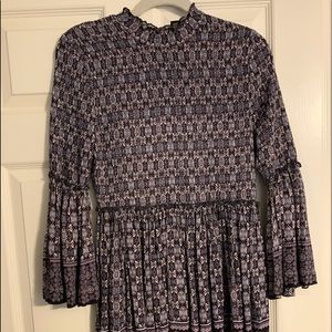 Flattering, low turtleneck dress